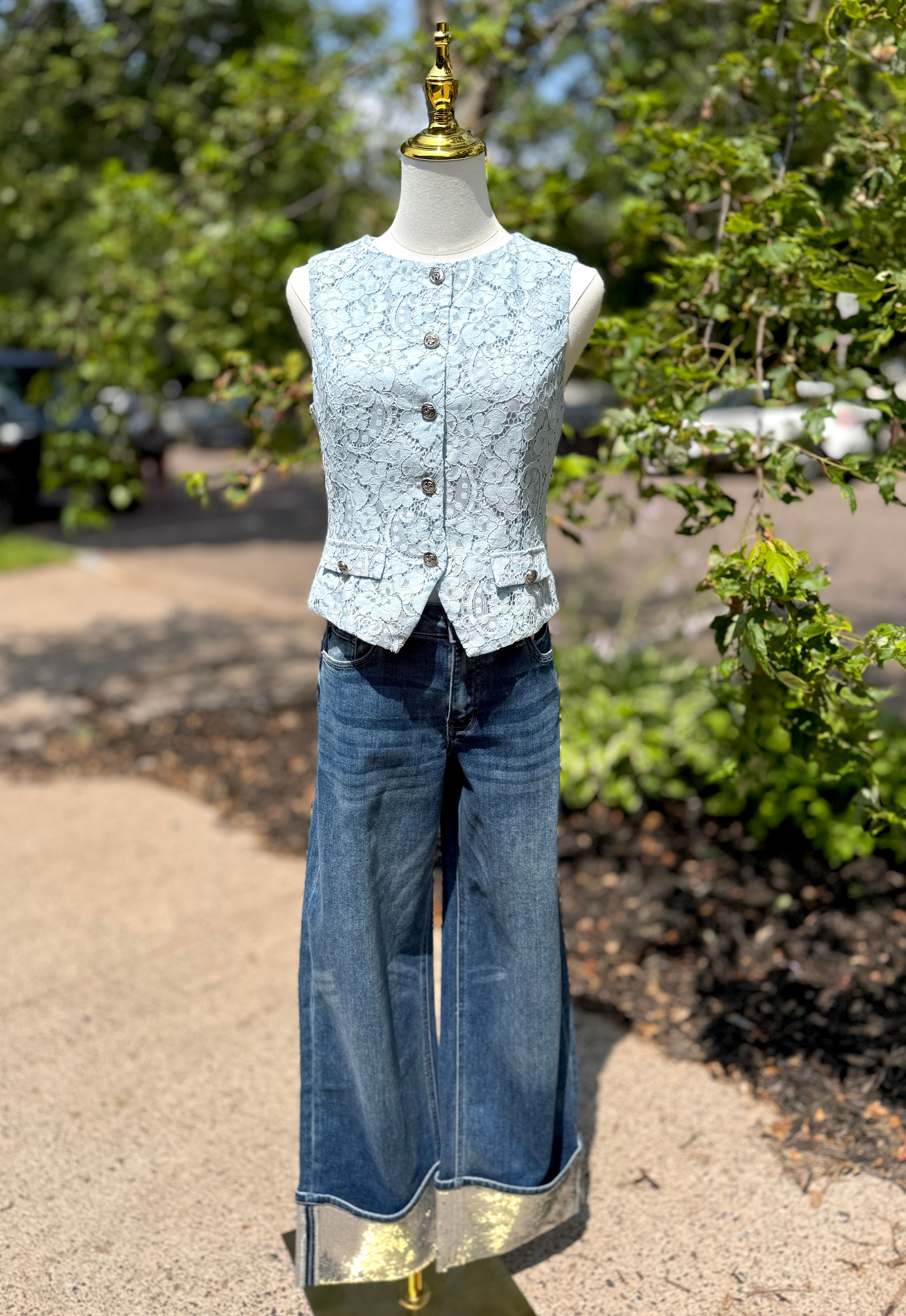A solid woven vest