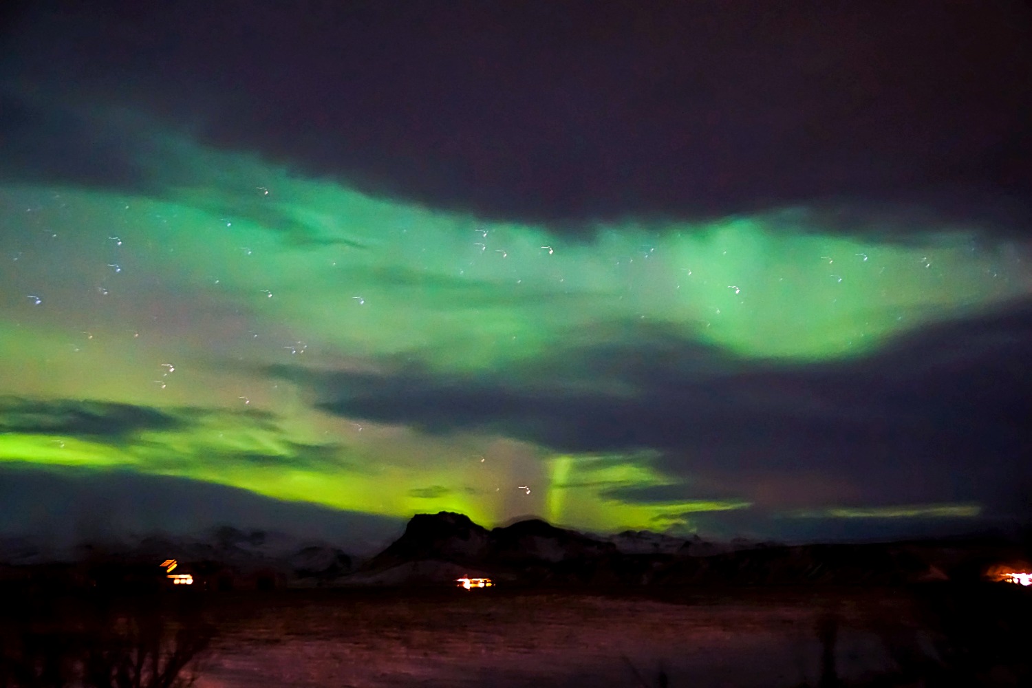 Northern Light Encounter In Mid Hvoll Cottages Iceland