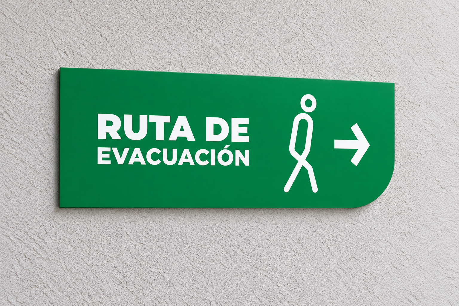 Señal verde de ruta de evacuación de Vergel Plaza