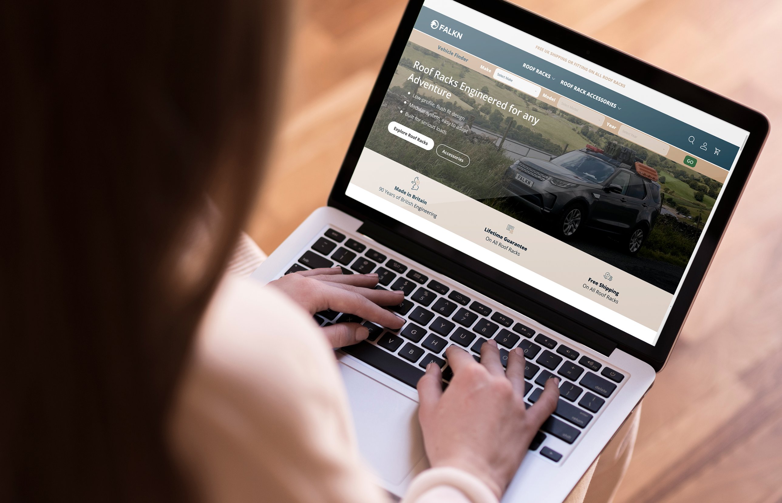 The launched FALKN website on a laptop, showing the vehicle finder, hero and trust badges