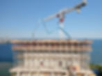 Water’s Edge at Cove condo under construction on the South Etobicoke lakeshore, with cranes and scaffolding against the waterfront backdrop