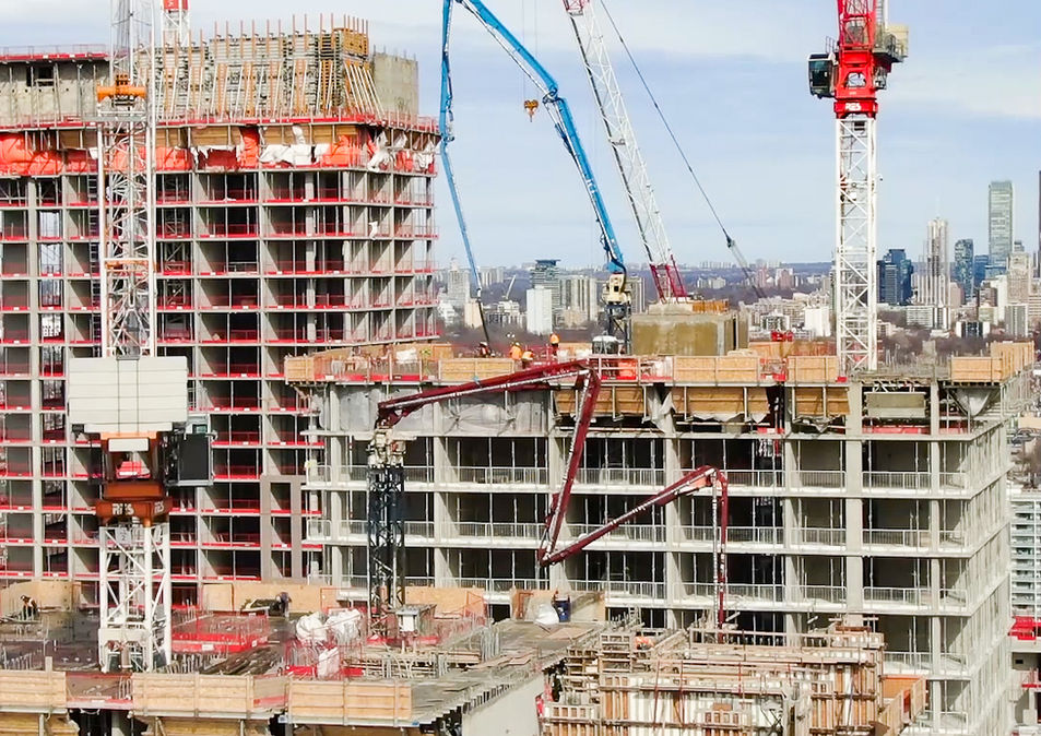 JCL Concrete Pumping concrete pour at the 74 Croatia Street multi–high-rise development in Toronto, with extended concrete pumps and cranes on site.