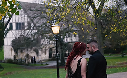 The Hospitium Video_Couple Close up with venue behind.png