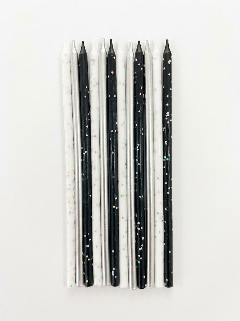 VELAS METÁLICAS BLANCA, PLATA Y NEGRAS - 12 PZS