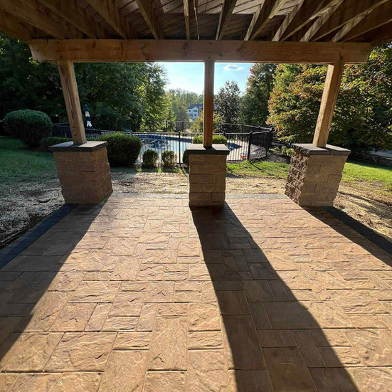 Under-Deck Patio with Pavers & Stone-Wrapped Posts