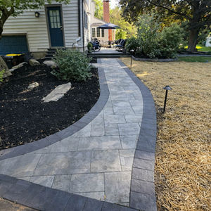 Custom Patio & Fire Pit Installation Connecting Driveway, Rear Entry & Outdoor Living Areas