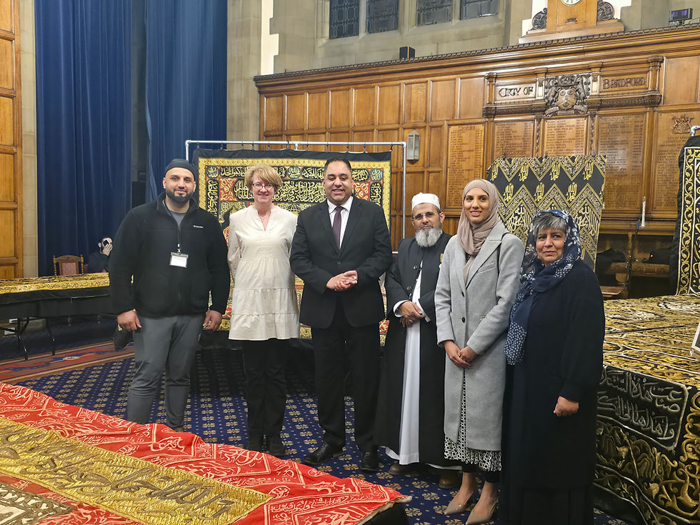 MP Imran Hussain, Susan Hinchcliffe, Tauseef Malik, Dr Sofia Buncy MBE, and Cllr Aneela Ahmed stand