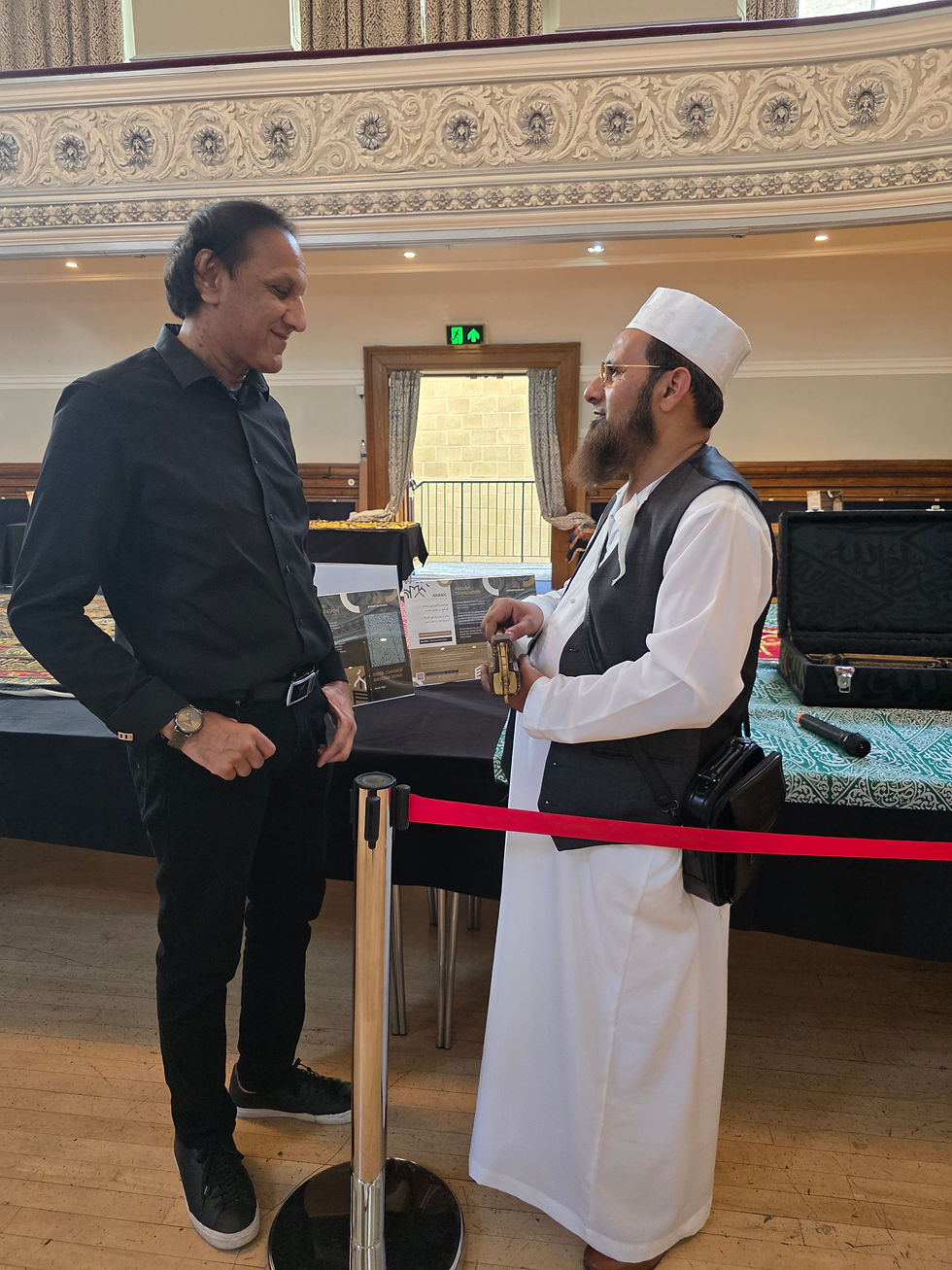 Cllr Masood Ahmed holds the sacred Maqaam Ibrahim Key, smiling with reverence and awe alongside Shei