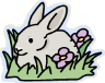 bunny in grass and flowers