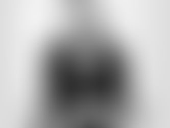 Melissa Campbell in a striped suit seated on a white couch. Text: "Elevate" and "I'm an Elevate 2026 mentor." Black and white theme.