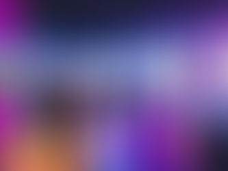 People connecting in a modern gallery with colorful lights and digital displays on walls. Ambient purple and orange hues create a lively immersive mood.