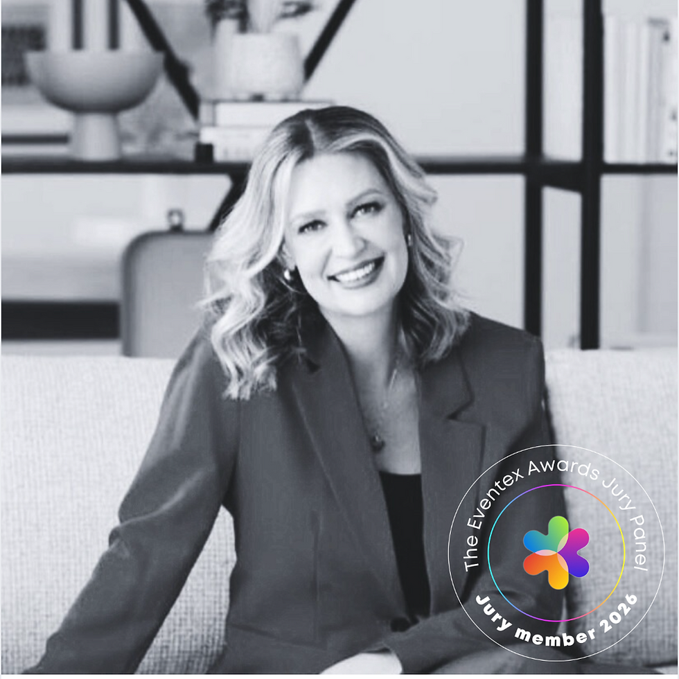 Melissa Campbell, smiling in suit on couch, grayscale setting with shelves in background. Eventex Awards Jury member 2026 badge on image.