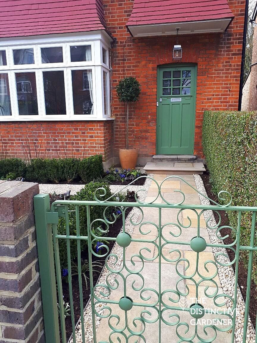 The gate, path and door after