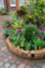 Circular brick flower beds