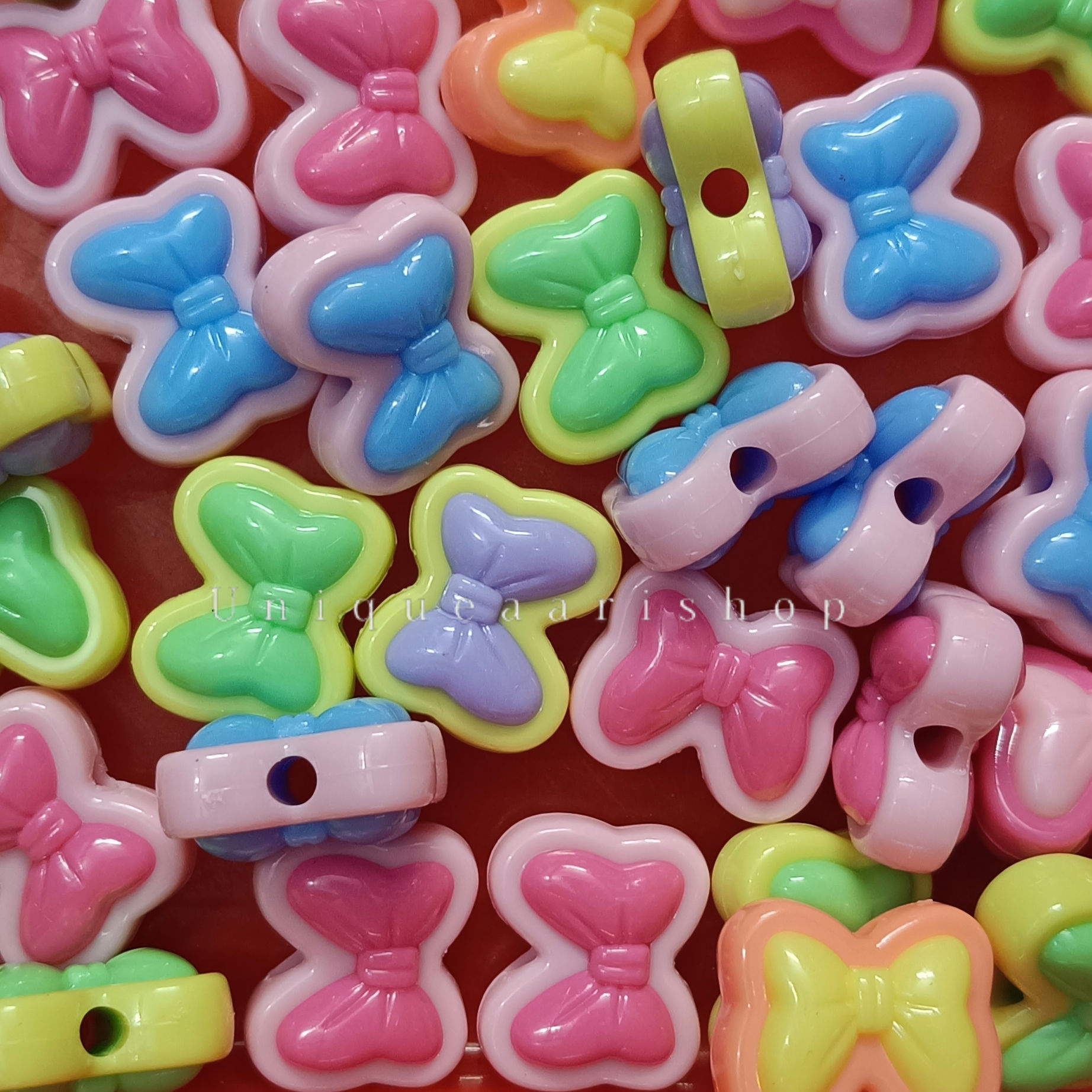 Assorted Bow Plastic Beads -5 pcs