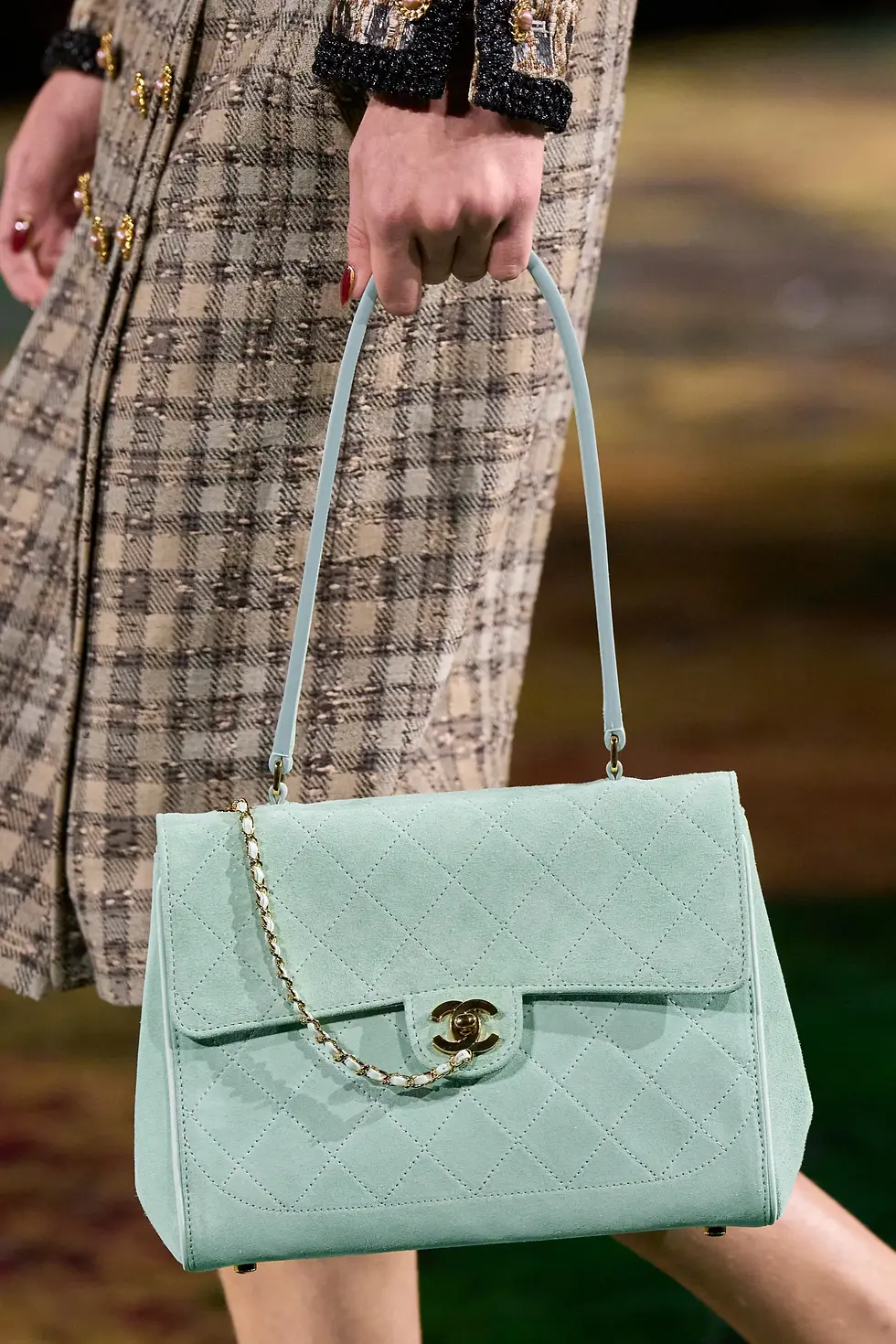 Mint-green quilted flap bag on the Chanel Spring 2027 runway.