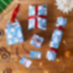 DIY Gift Boxes Set featuring colourful Christmas snowmen design with matching gift tags and festive ribbons