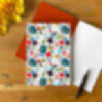 Notebook cover featuring hand drawn elements from the movie Bridget Jones’ Diary, lined pages, red inside cover