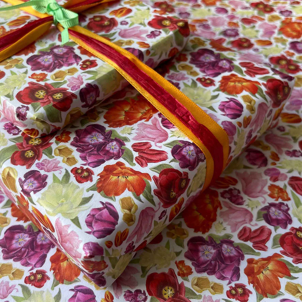 Thumbnail: Gift wrap featuring brightly coloured detailed tulips against a white backgroun