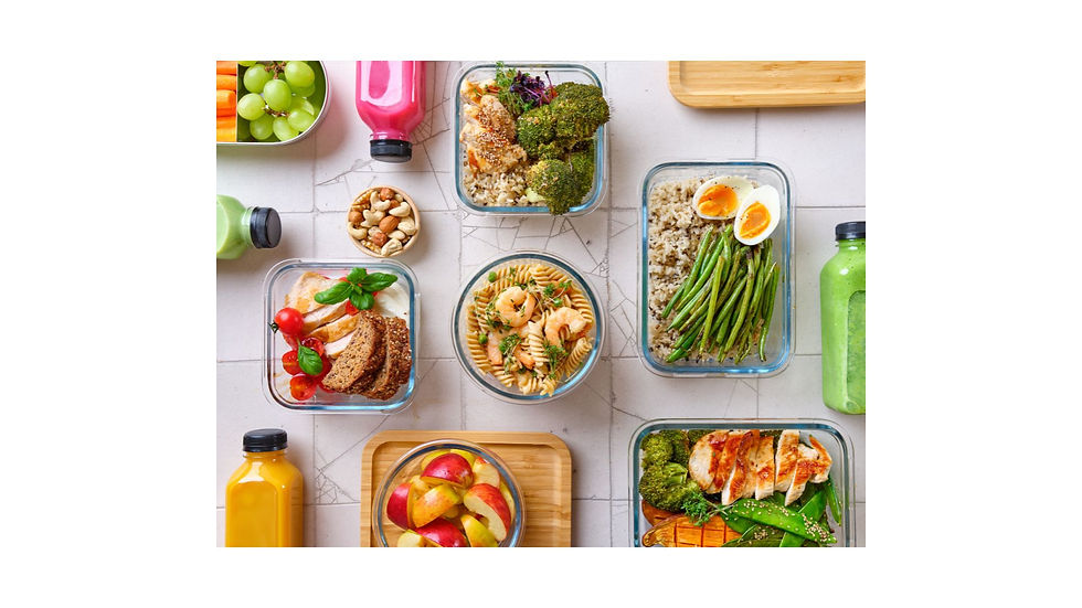 A vibrant display of healthy meal prep ideas featuring grilled chicken, fresh veggies, whole grains, and colorful fruits, complemented by refreshing juices and nuts.