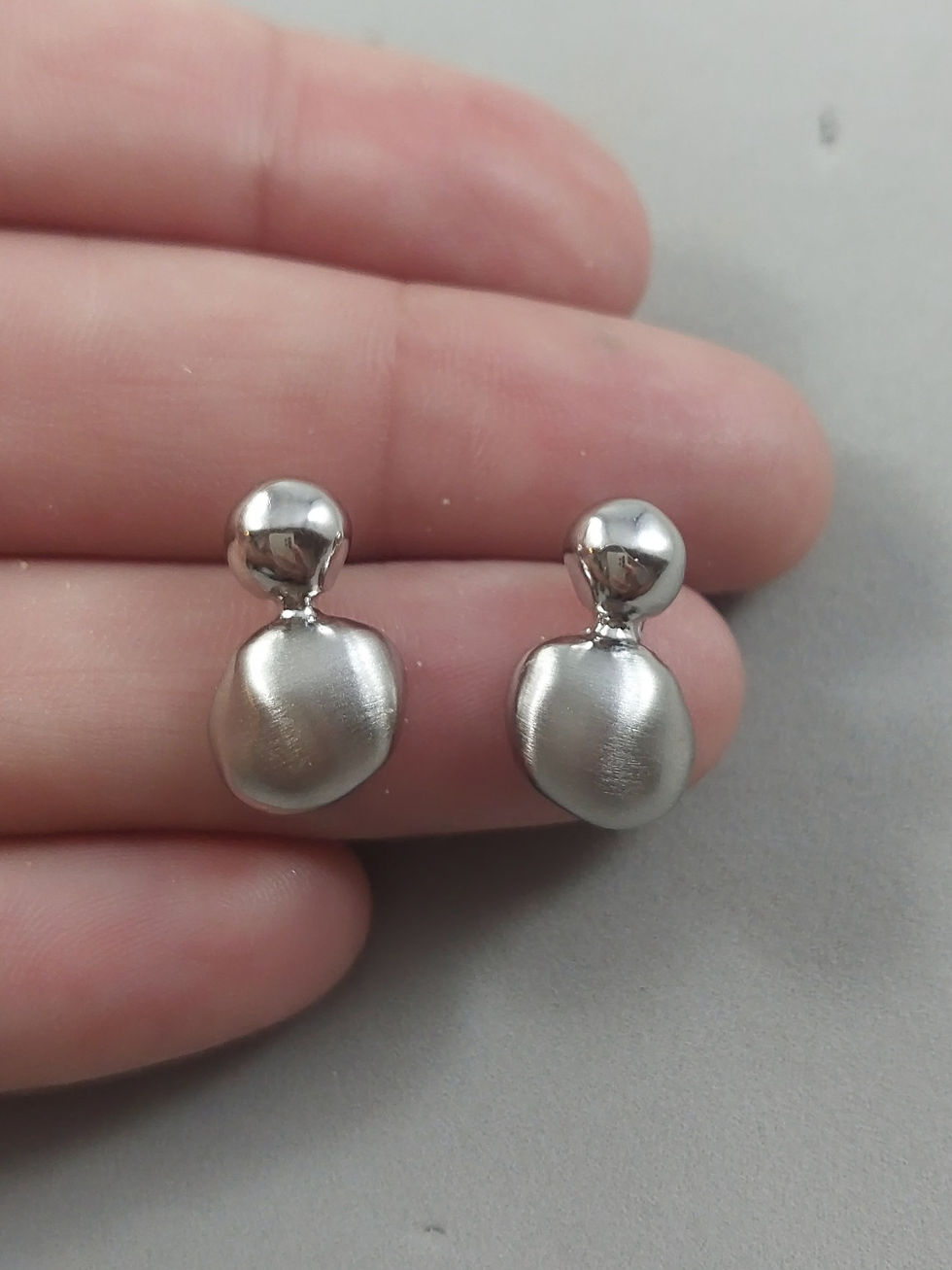 Miniatura: Brinco disforme 2