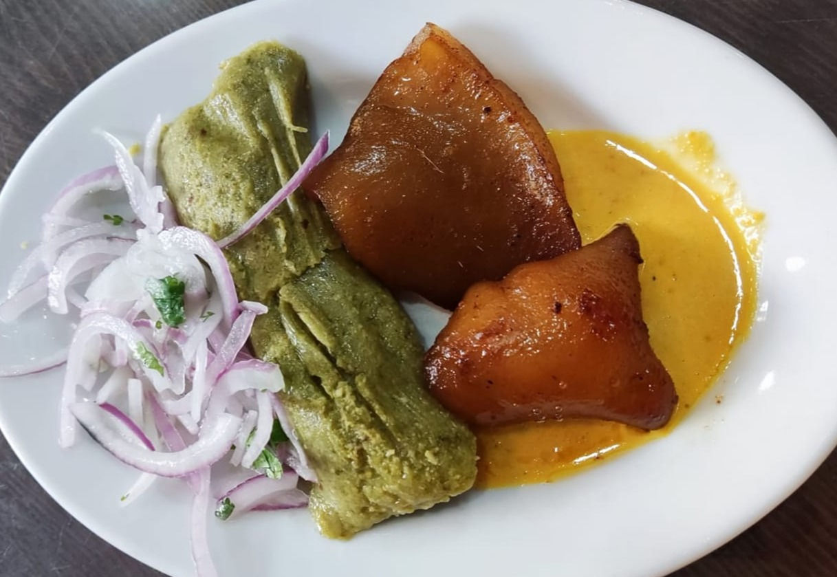 tamal verde de maiz con cuerito de chancho