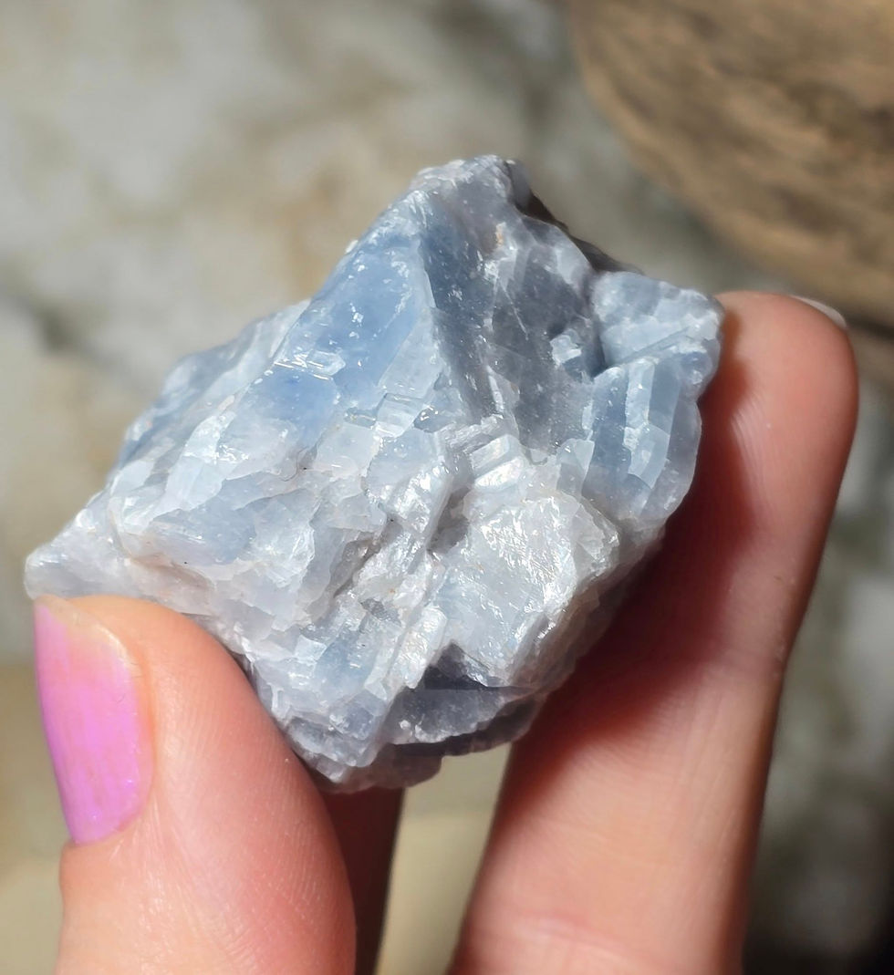 Thumbnail: blue calcite hand held