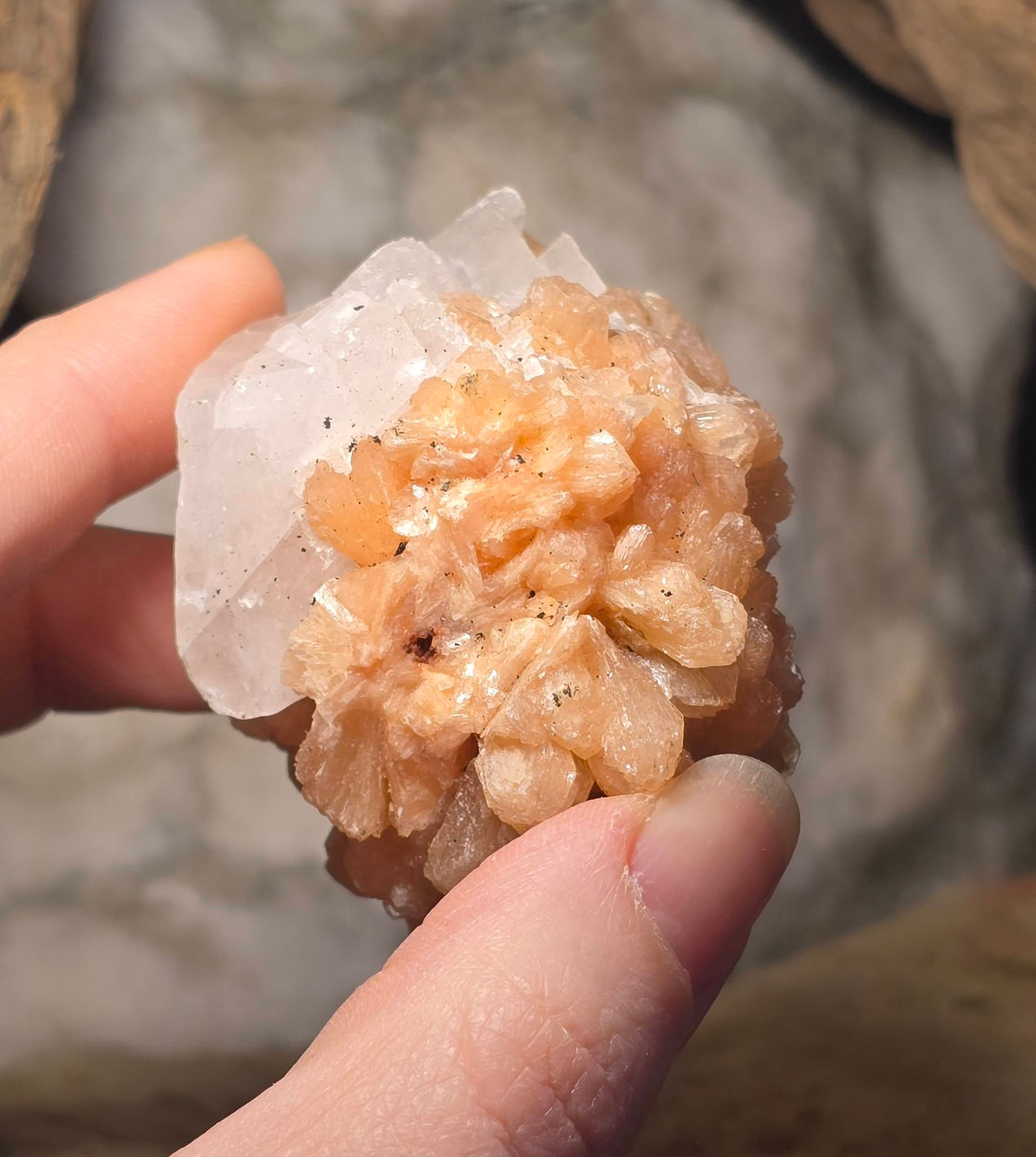 stilbite and calcite zeolite crystal hand held