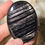 Thumbnail: hypersphene palmstone hand held front view