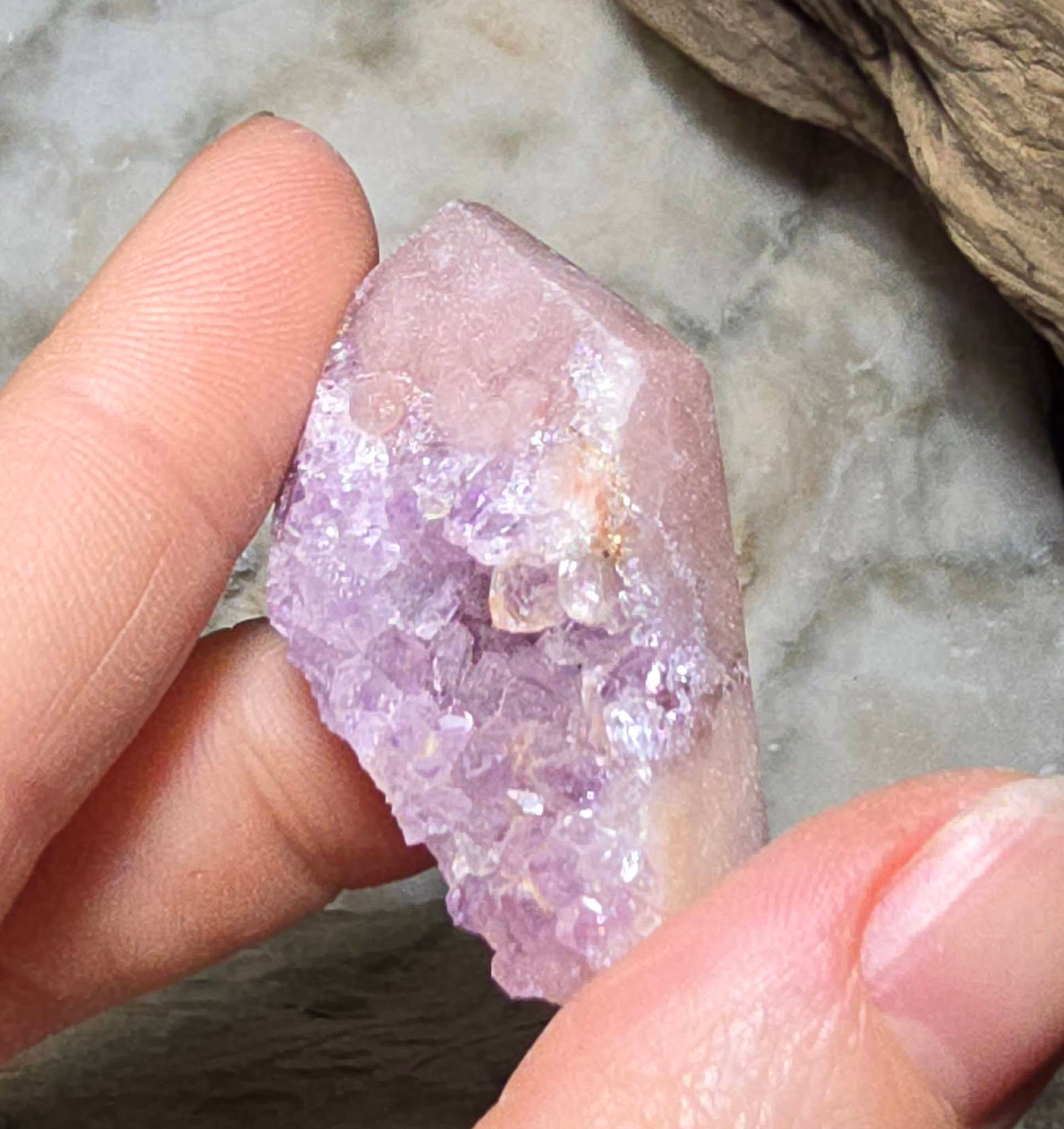 druzy pink amethyst shape hand held front view