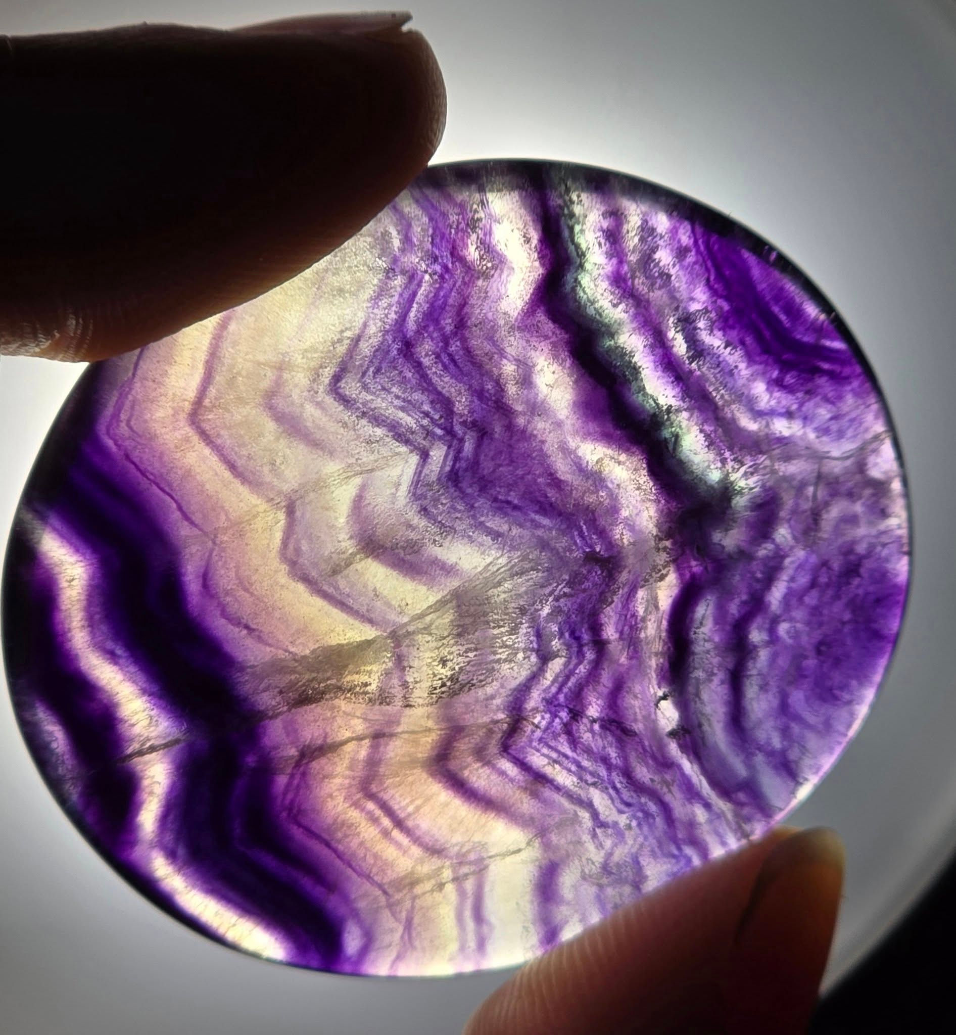rainbow fluorite palmstone hand held