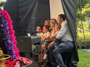 Beyond the Cake: 5 Ways a Photo Booth Elevates Your Wedding Reception (and Keeps Guests Entertained!)