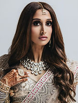 South Asian bridal makeup with defined eyes, sculpted complexion and traditional bridal styling