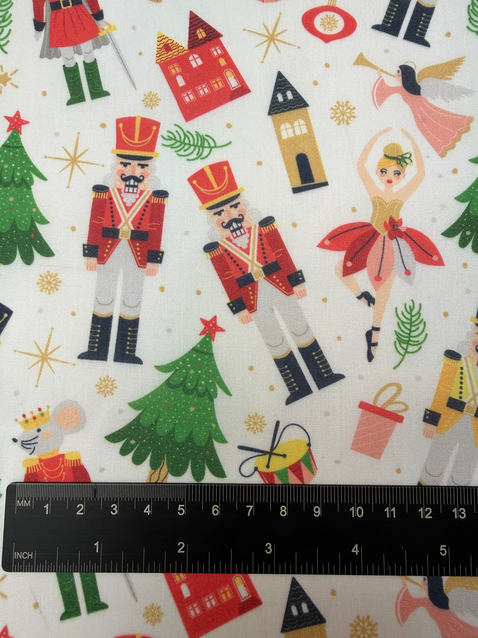 Nutcracker and Ballerina White Christmas Polycotton Fabric Ruler View