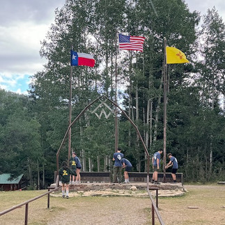 scouts bringing down flags