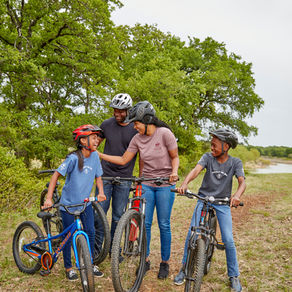 family riding bikes