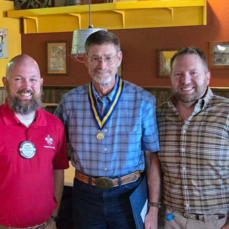 pecos valley rotary club presents mike hunter with cliff covhterman award