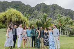 Candid Editorial photo of wedding guests enjoying a chat at Paliku Gardens