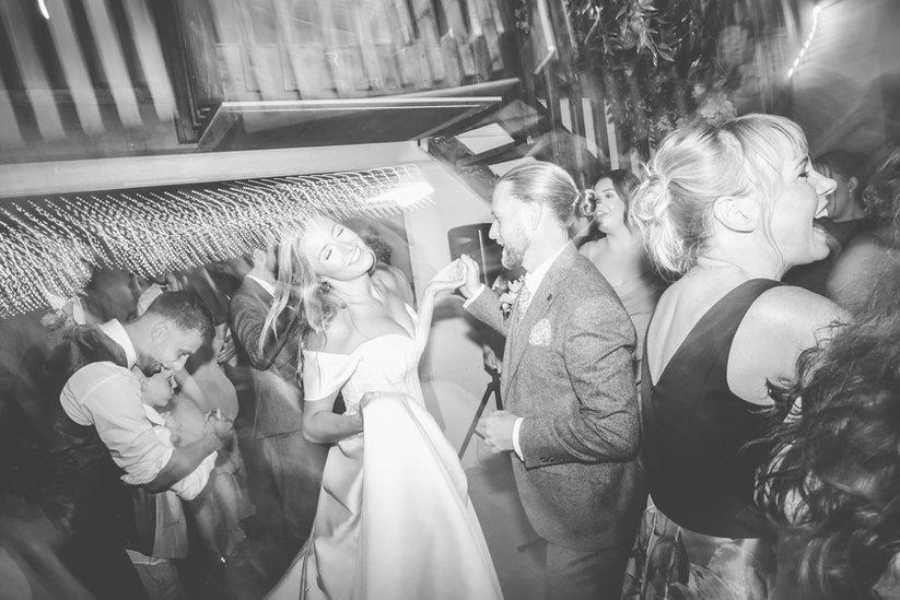 Jordan and Alexa dancing together at their wedding reception