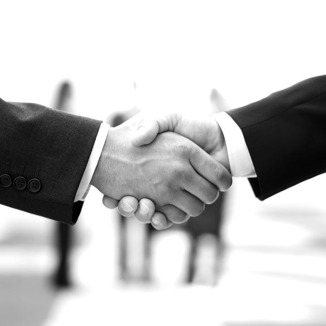 Two%20Men%20Shaking%20Hands_edited.jpg