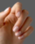 Young woman's hands with colorful and decorated nail manicure with modern, innovative and