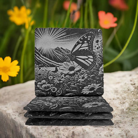 Slate Coasters-Honey Bee On Honeycomb, 4 circular slate coasters, measuring 4" x 4," come in. a 4-pack, sitting on a marble counter, jar of honey, cutting board, and honey stirrer in the background.
