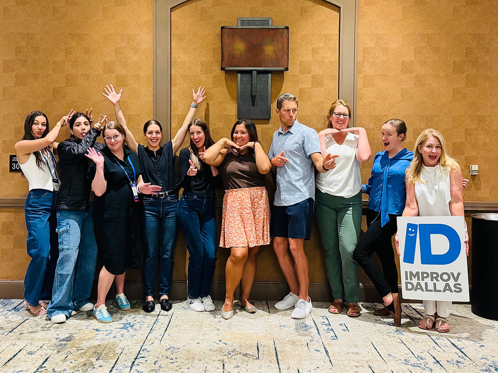 Eye-level view of a corporate team participating in an improv workshop