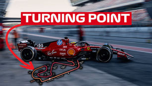 Red race car speeding on track beside blurred pit crew. Text "TURNING POINT" with arrow pointing to circuit diagram in lower corner.