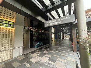 Signage reading LINK TO ORCHARD ROAD 24 ACCESS at the rear entrance