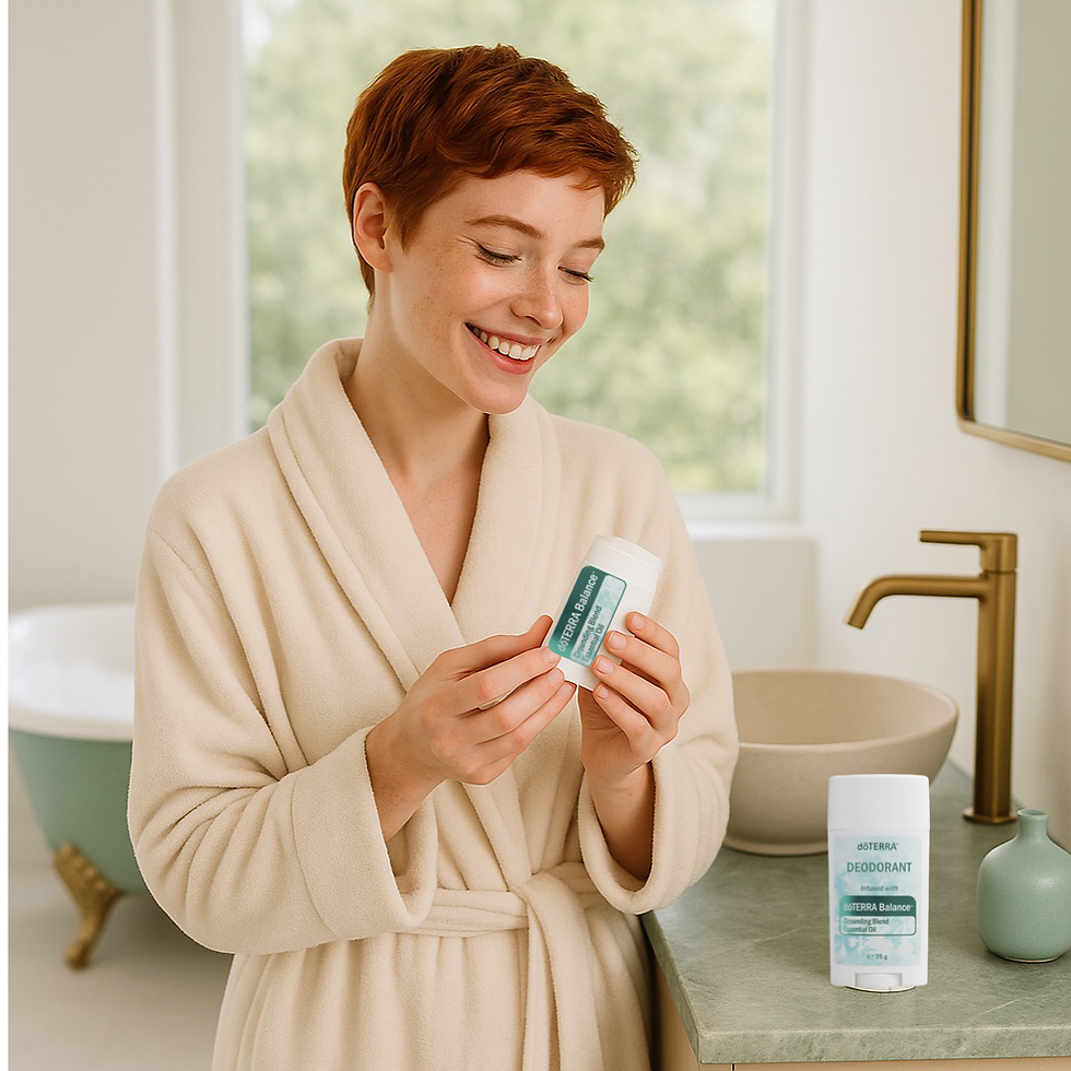 Miniaturbild: Frau lächelt mit Deo Balance doTERRA  in der Hand - Naturkosmetik
