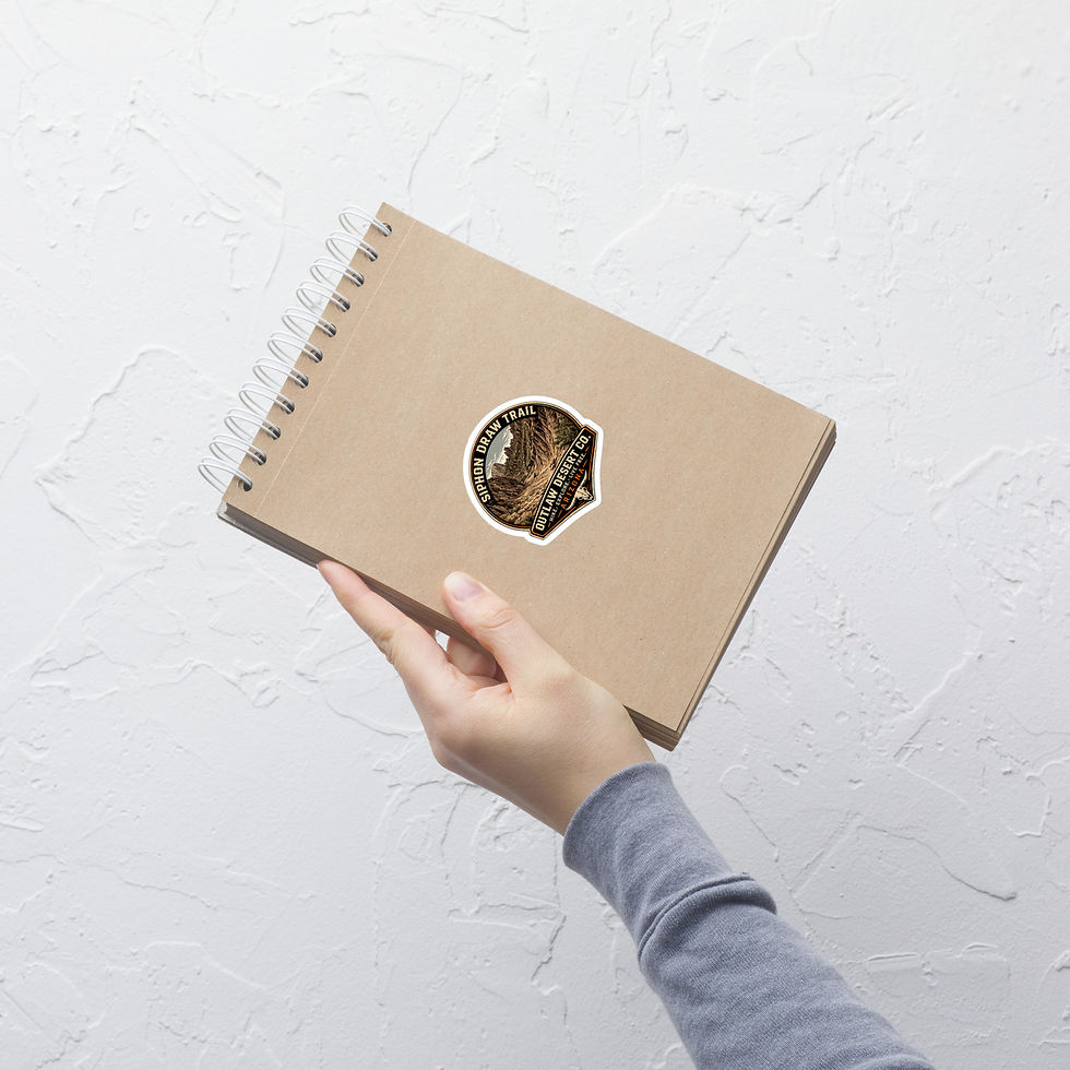 Thumbnail: Hand holding notebook with Wave Cave sticker