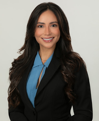 Professional business headshot of an executive woman in black blazer and blue blaizer against a clean studio background in Weston, Florida.