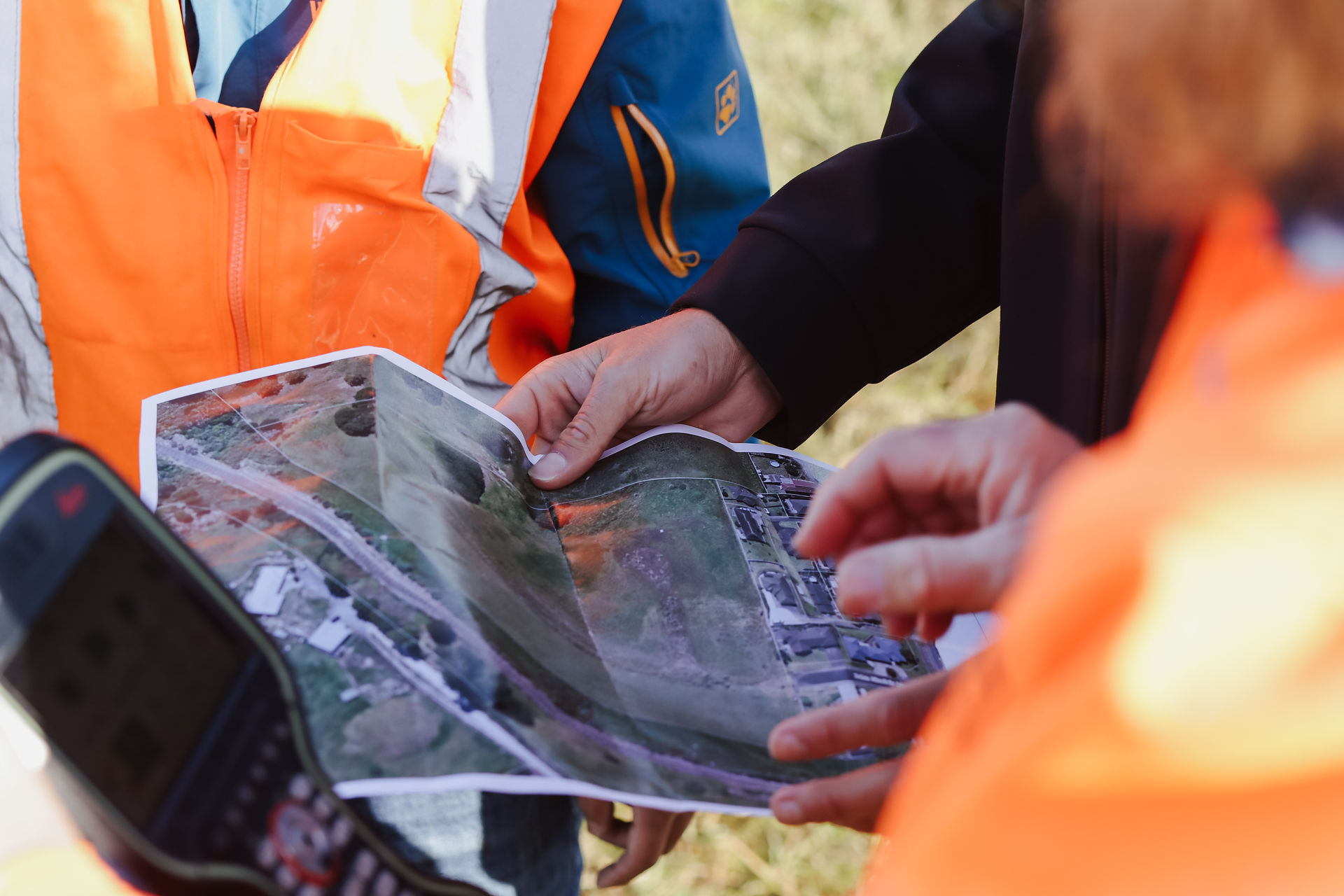 surveyors and ecologist analysing a subdivision plan