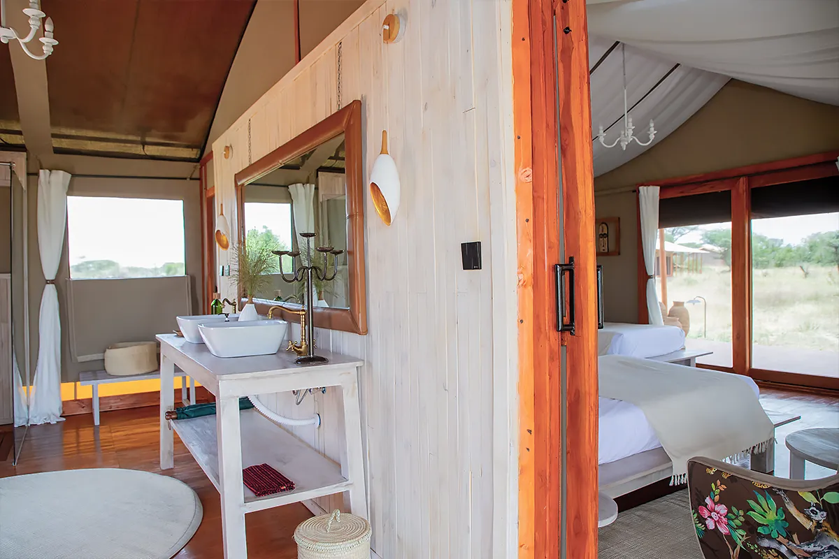 Located deep in the heart of Serengeti National Park, Tamu Tamu Tented Camp offers an exceptional, eco-luxury safari experience amidst one of the most stunning wildlife destinations on earth. Surrounded by endless, sweeping plains and teeming with majestic wildlife, this camp serves as the perfect base camp for adventurers seeking an authentic, immersive connection to the African wilderness.  From the moment you arrive, the friendly and attentive staff will ensure you experience the legendary warmth of Tanzanian hospitality, combined with the raw, breathtaking beauty of the Serengeti.